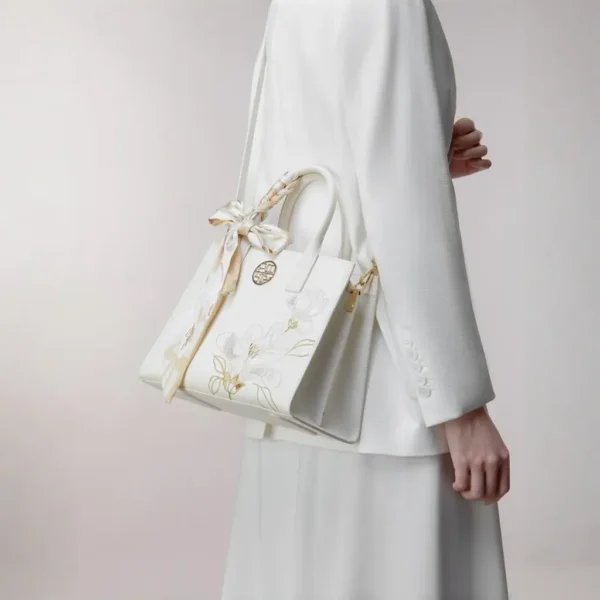 Pure White Handbag with Magnolia Embroidery and Matte Finish - Image 9