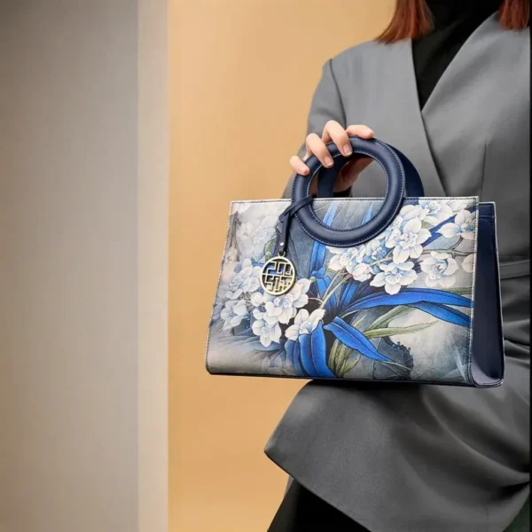 Dark Blue Handbag with Orchid Embroidery and Matte Finish - Image 8