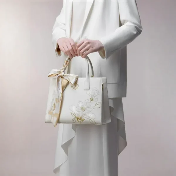 Pure White Handbag with Magnolia Embroidery and Matte Finish - Image 2